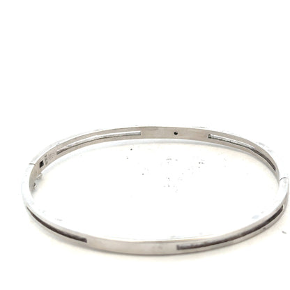 Silver bracelet bangle weighing 13.5g, unbranded, with a sleek, minimalist design, shown on a plain background.