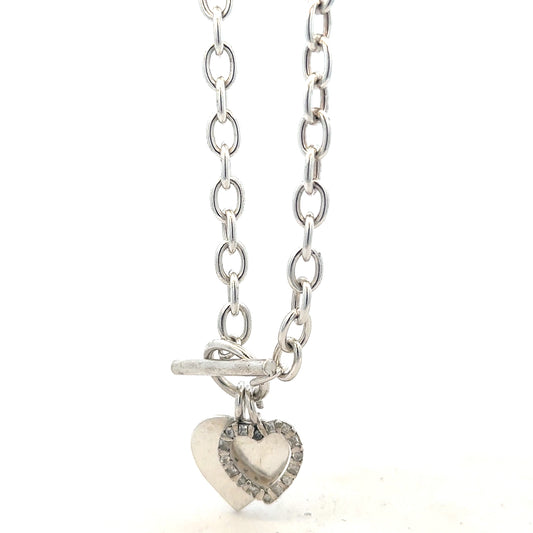 Silver bracelet weighing 19.5g with a sleek, polished design, featuring smooth links and a secure clasp.