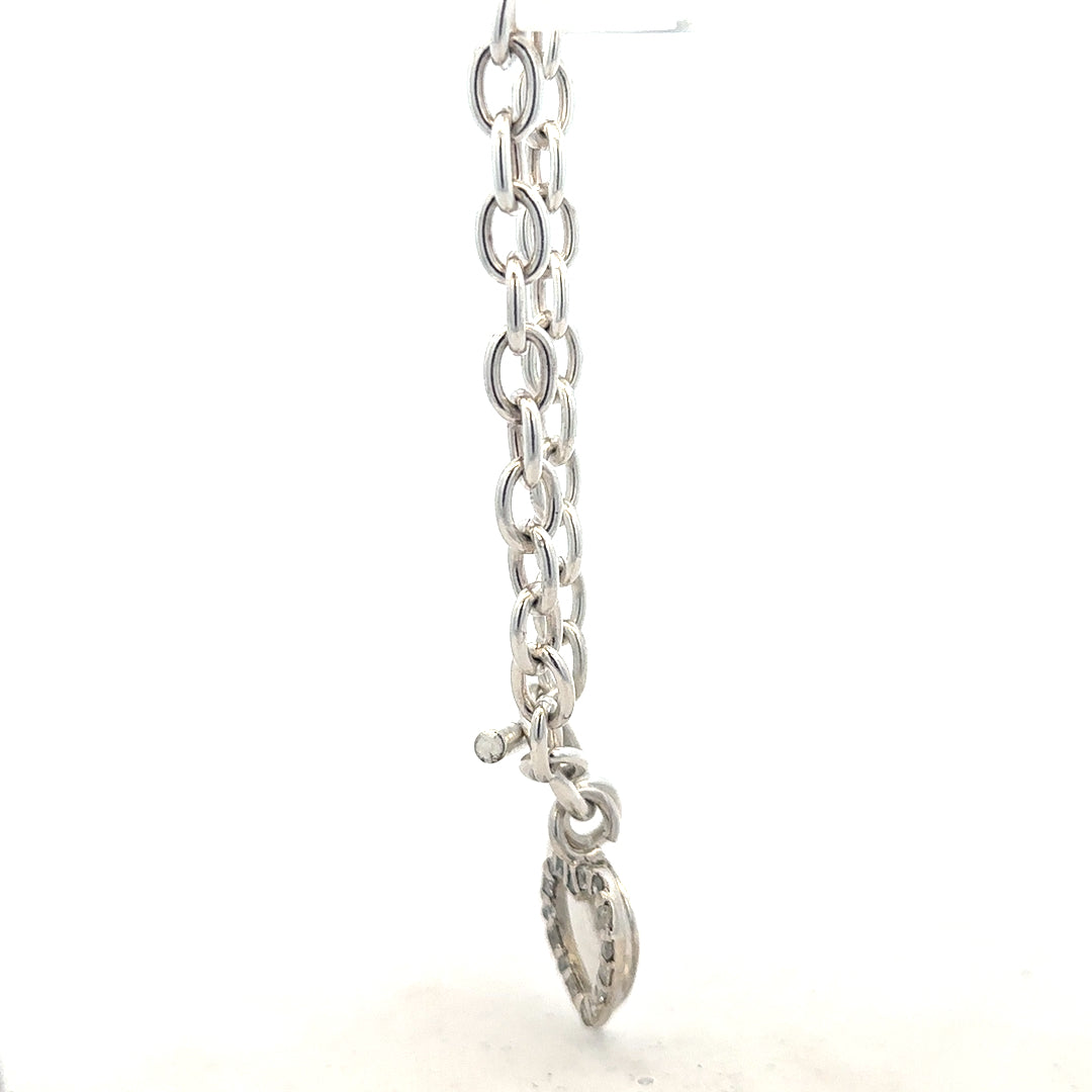 Silver bracelet weighing 19.5g with a sleek design, displayed on a neutral background.