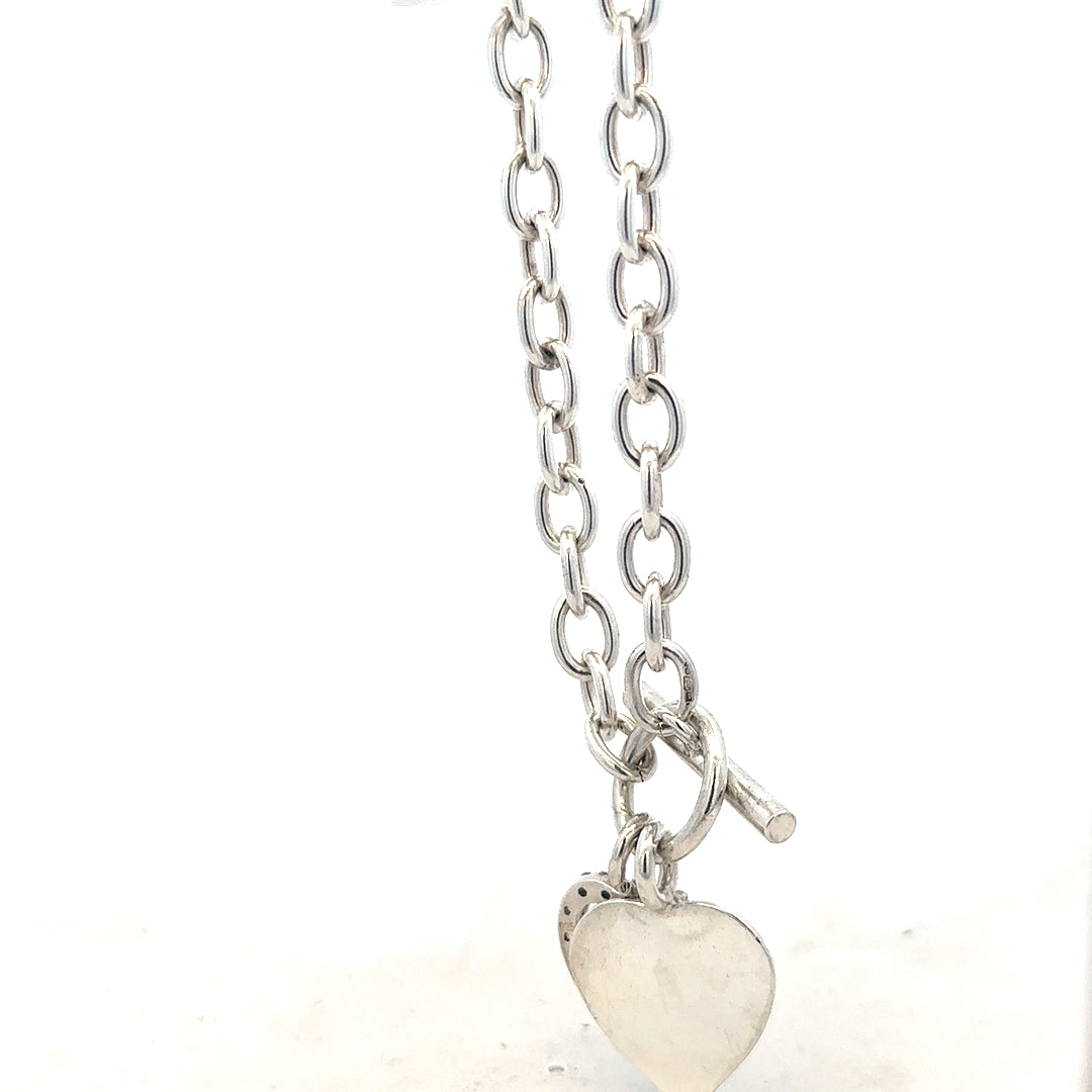 Silver bracelet weighing 19.5g with intricate design, unbranded jewelry accessory displayed on a neutral background.