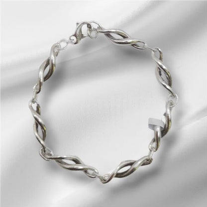 Silver bracelet, 19cm length and 14.4g weight, displayed on a neutral background, showcasing its sleek, metallic design.