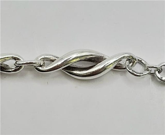 Silver bracelet measuring 19cm, weighing 14.4g, featuring a sleek unbranded design with a polished finish.