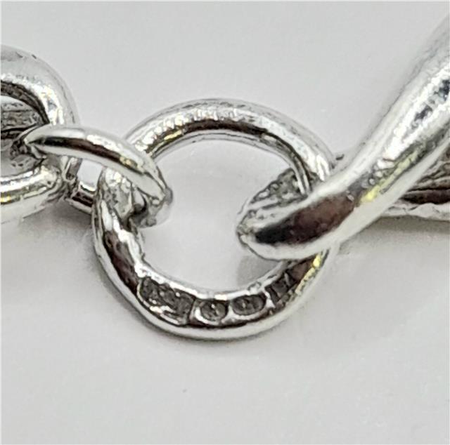 Silver bracelet, 19cm length, 14.4g, unbranded jewelry accessory with a sleek, polished finish.