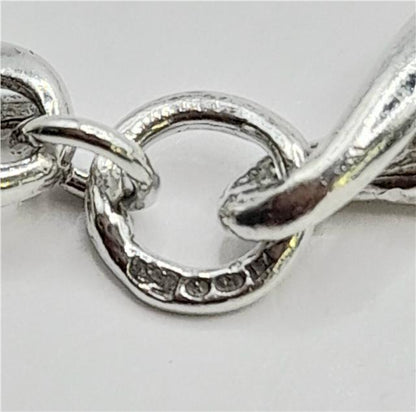 Silver bracelet, 19cm length, 14.4g, unbranded jewelry accessory with a sleek, polished finish.