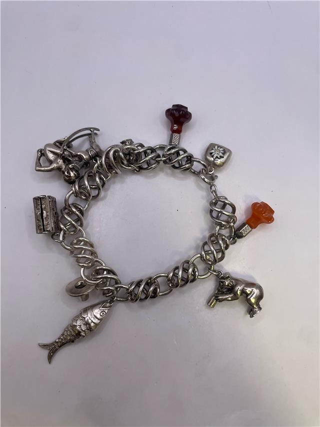 Silver bracelet weighing 73.5 grams with a sleek design, crafted from high-quality silver, perfect for accessorizing.
