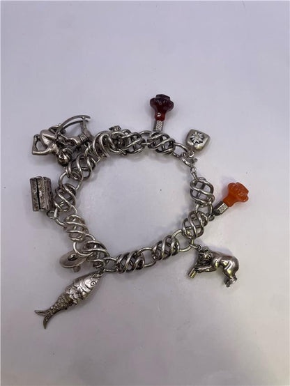 Silver bracelet weighing 73.5 grams with a sleek design, crafted from high-quality silver, perfect for accessorizing.