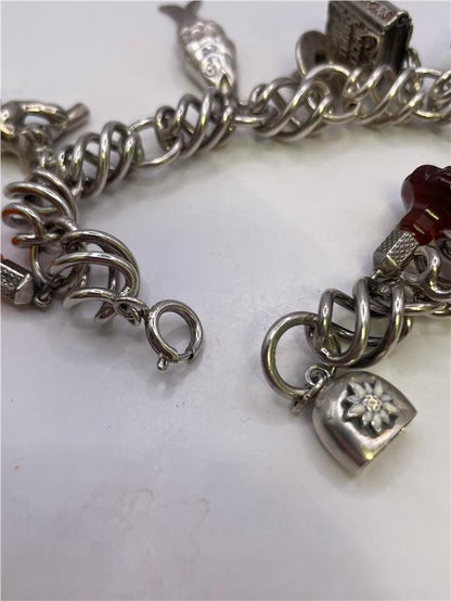 Silver bracelet weighing 73.5g with a sleek design, displayed on a neutral background.