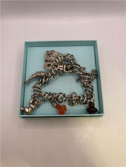 Silver bracelet weighing 73.5g with intricate design, crafted from high-quality silver, versatile accessory for everyday wear.