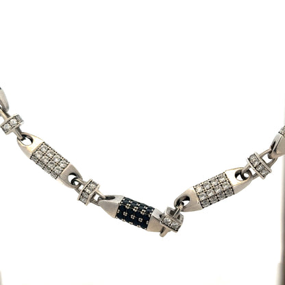 Silver chain weighing 113.4g, unbranded jewelry chain with a detailed link design, shown in a close-up image.