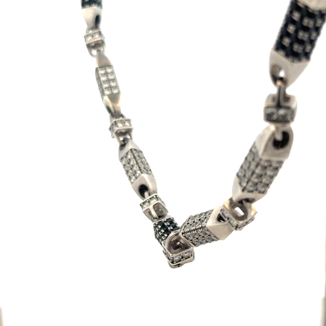 Silver chain weighing 113.4g, unbranded jewelry chain with intricate links, showcased on a neutral background.