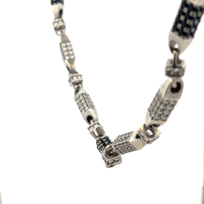 Silver chain weighing 113.4g, unbranded jewelry chain with intricate links, showcased on a neutral background.