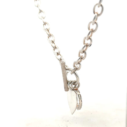 Silver chain weighing 32.4g with a classic design, shown in a close-up image highlighting its polished surface and link details.