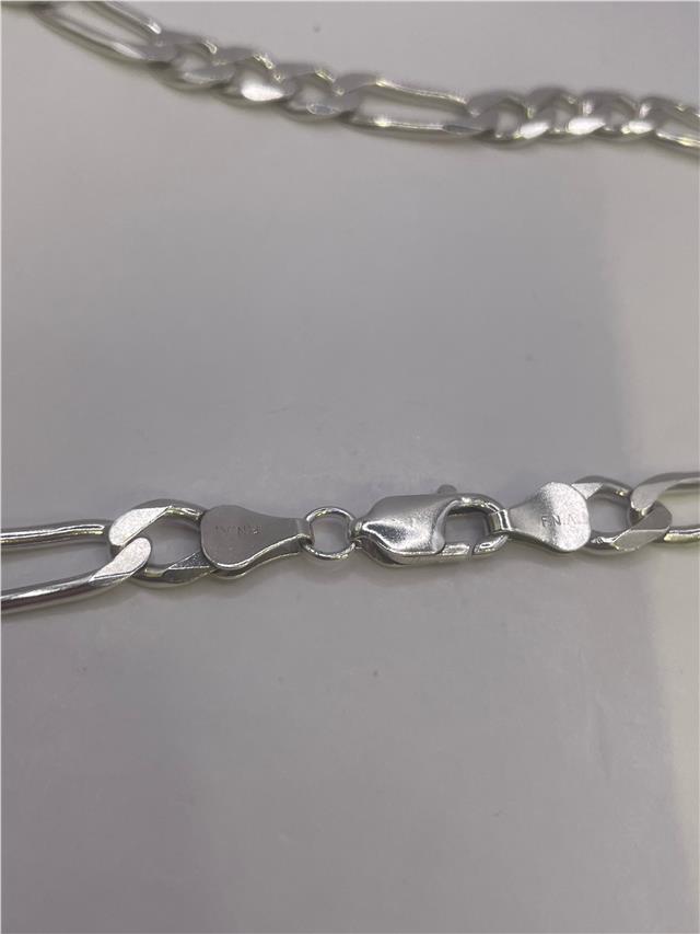 Silver chain weighing 31.5g, featuring a classic design, suitable for necklaces or jewelry accessories.
