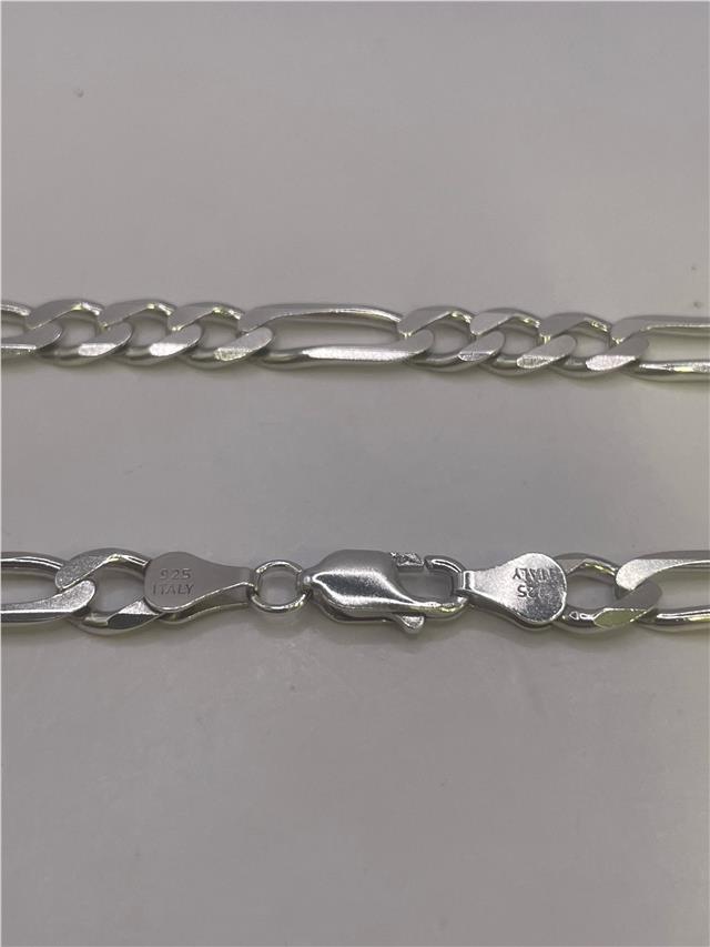 Silver chain weighing 31.5g, featuring a sleek design, unbranded jewelry chain for stylish accessories or jewelry making.