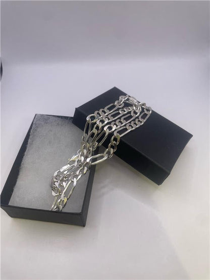 Silver chain weighing 31.5g, unbranded, with a detailed view of its sleek, linked design perfect for jewelry.
