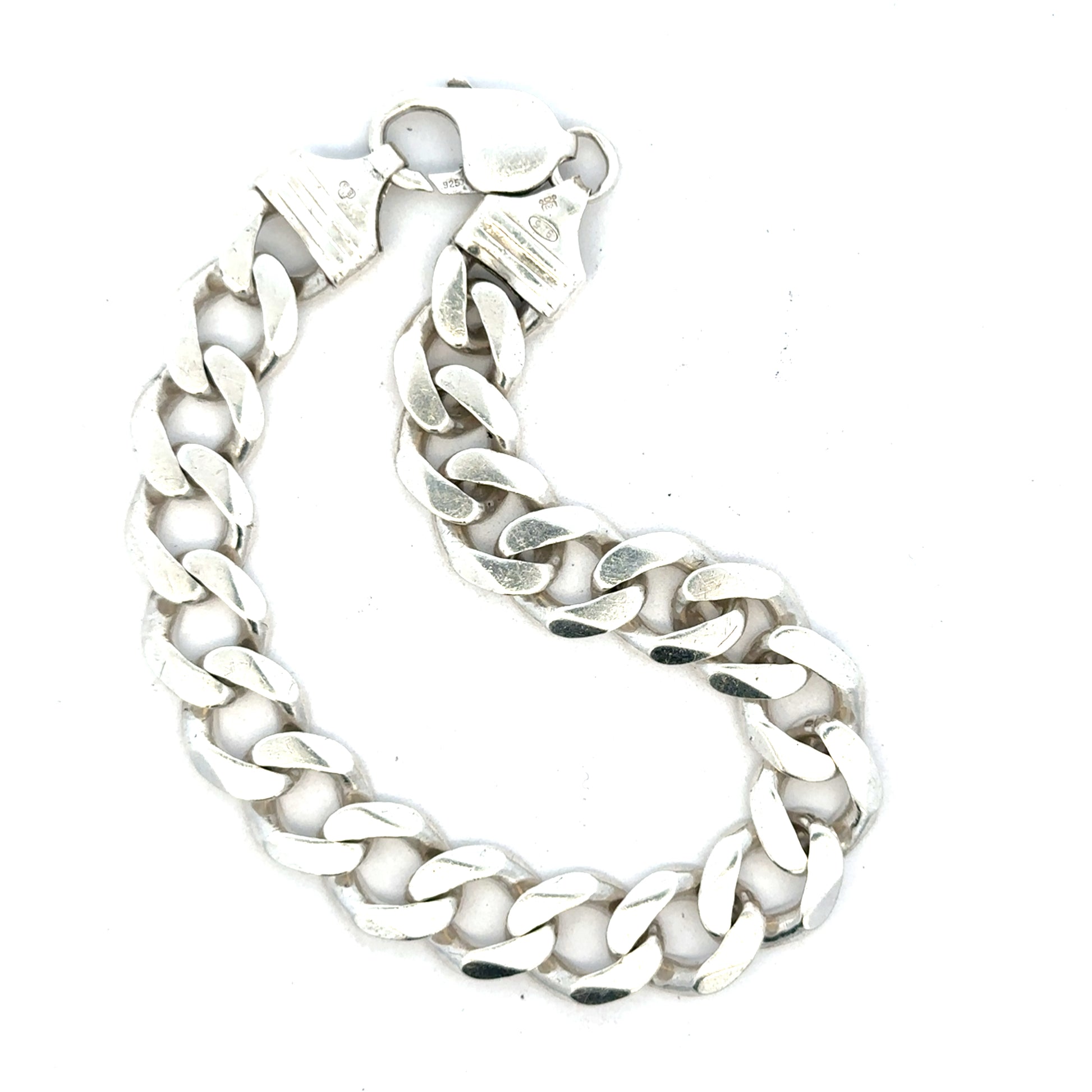 Silver curb bracelet weighing 33.7g with a classic chain design, unbranded jewelry accessory for everyday wear.