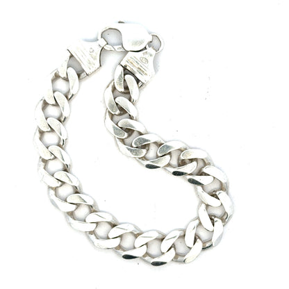Silver curb bracelet weighing 33.7g with a classic chain design, unbranded jewelry accessory for everyday wear.