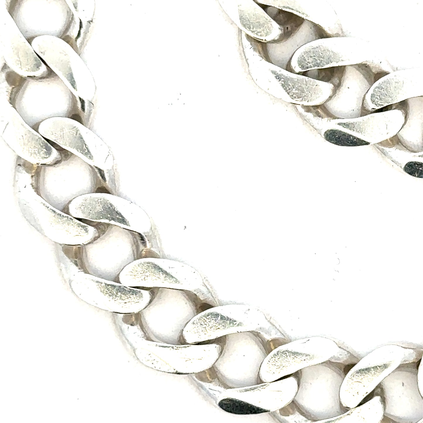 Silver curb bracelet weighing 33.7g, featuring classic chain links, unbranded jewelry accessory for stylish wear.