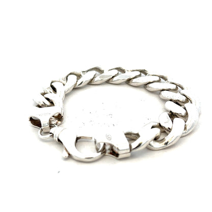 Silver curb bracelet weighing 90.1g with a sleek chain design, unbranded jewelry accessory for everyday wear.