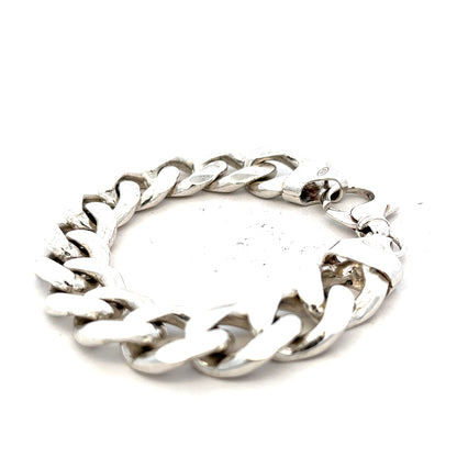 Silver curb bracelet weighing 90.1g, featuring a classic chain design, shown on a plain background.