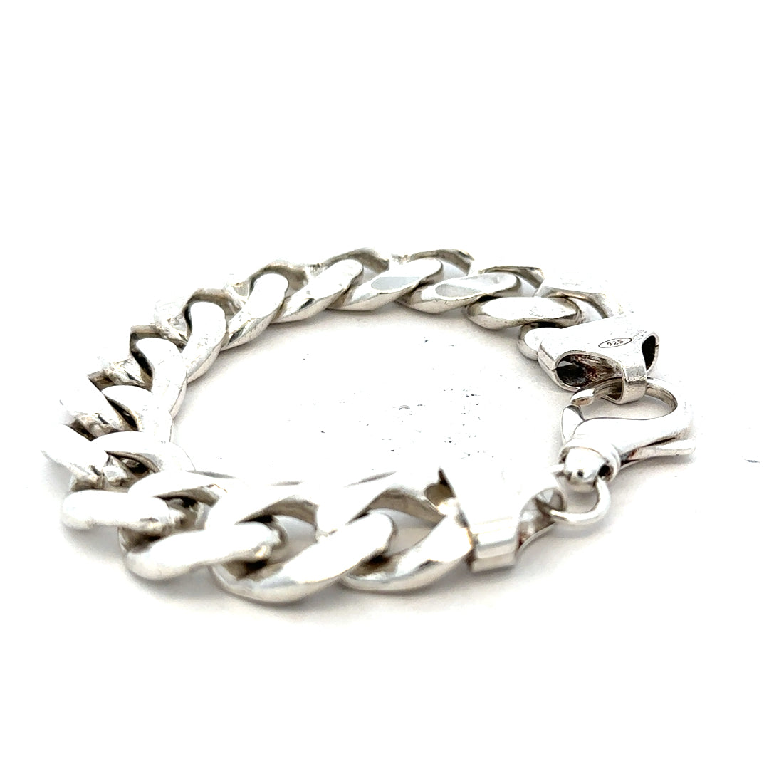 Silver curb bracelet weighing 90.1 grams with a sleek chain design, unbranded jewelry accessory displayed on a plain background