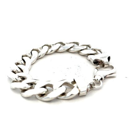 Silver curb bracelet weighing 90.1 grams with a sleek chain design, unbranded jewelry accessory displayed on a plain background