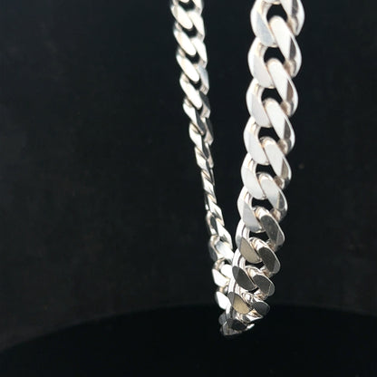 Silver curb chain weighing 109.9g, unbranded jewelry chain with a classic curb link design, displayed against a neutral background.