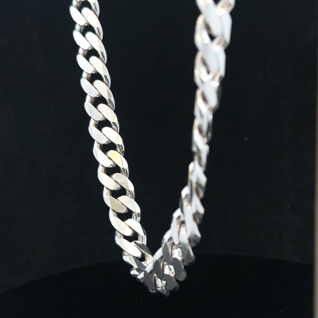Silver curb chain weighing 109.9g, unbranded jewelry chain with a sturdy design and polished finish.