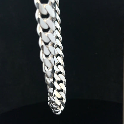 Silver curb chain jewelry, unbranded, weighing 109.9g, with detailed close-up of the sleek, interconnected links.