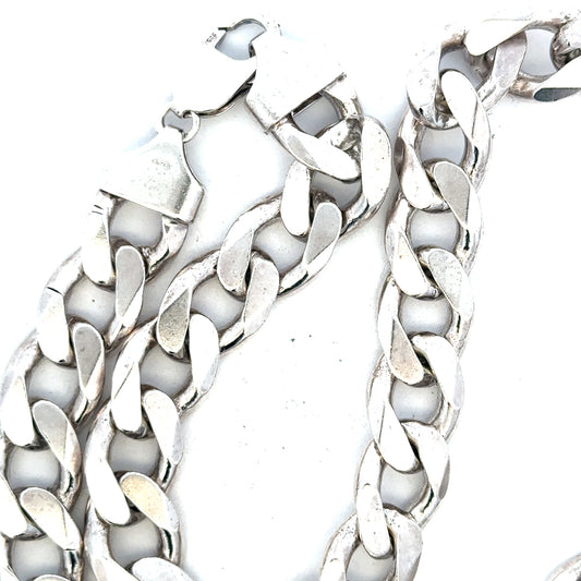 Silver curb chain weighing 134.5g, unbranded jewelry chain with a classic curb link design, shown in a close-up view.