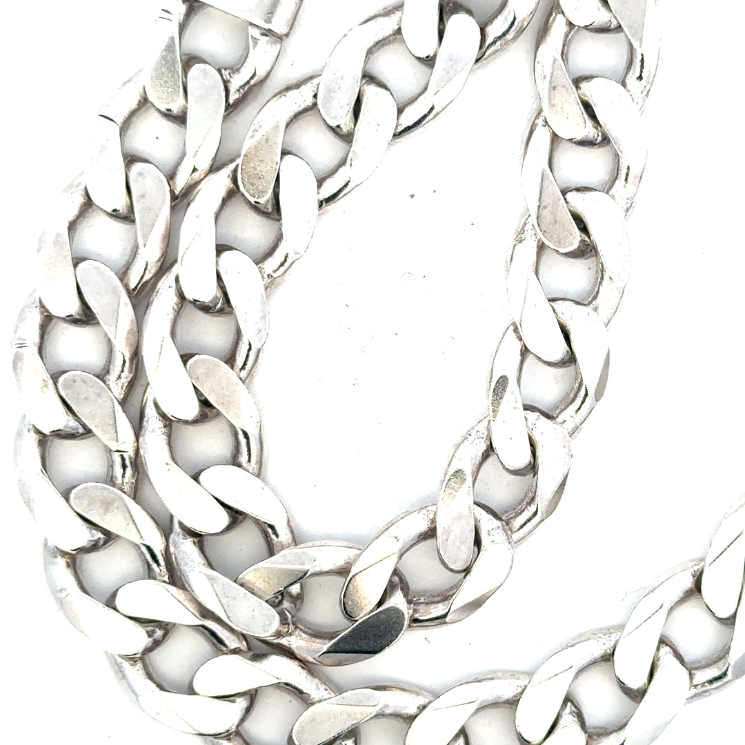 Silver curb chain weighing 134.5g, unbranded jewelry chain with a classic curb link design.