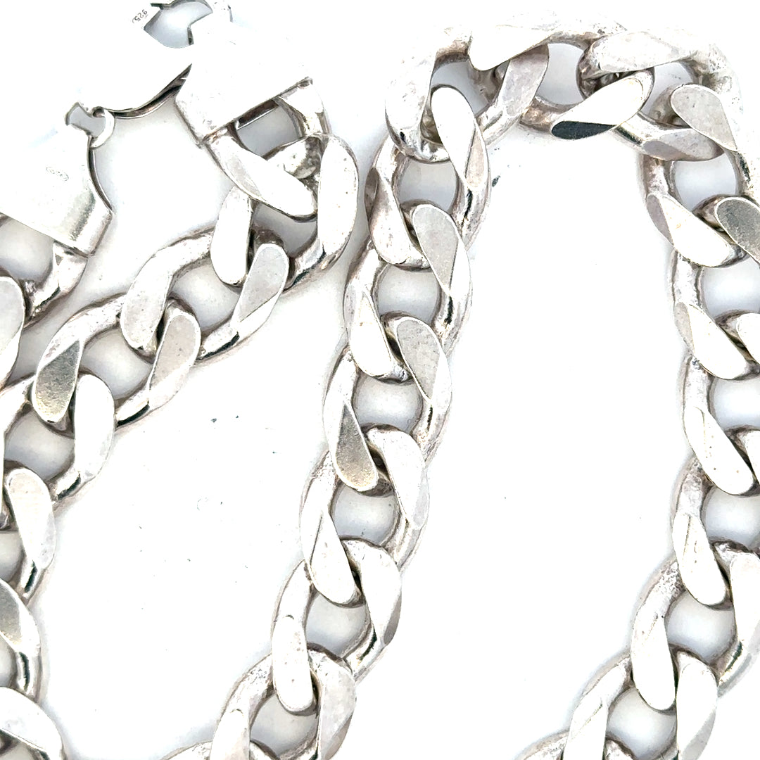 Silver curb chain weighing 134.5g, unbranded jewelry chain with a classic curb link design.