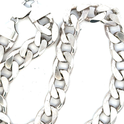 Silver curb chain weighing 134.5g, unbranded jewelry chain with a classic curb link design.