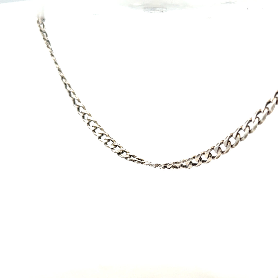 Silver curb chain weighing 16.2g, unbranded jewelry chain with linked oval design, shown in close-up image.
