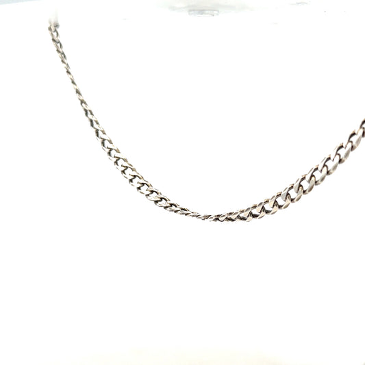 Silver curb chain weighing 16.2g, unbranded jewelry chain with linked oval design, shown in close-up image.
