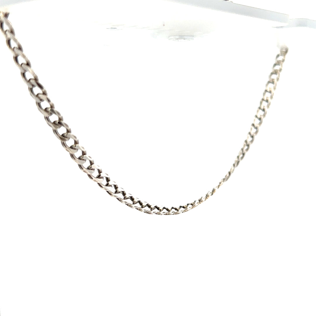 Silver curb chain weighing 16.2g with a classic design, shown in a close-up image highlighting its links and polished finish.