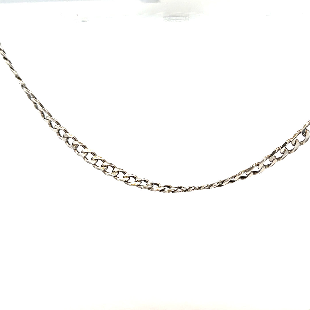 Silver curb chain, unbranded, 16.2g, displayed on a plain background, showcasing its links and metallic shine.