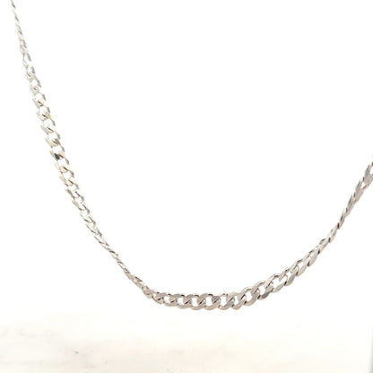 Silver curb chain weighing 16.4g, featuring a classic chain link design, ideal for jewelry or accessory styling.