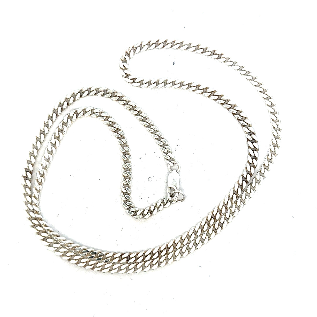 Silver curb chain weighing 24.8g, featuring a classic link design, crafted for a stylish unbranded jewelry piece.