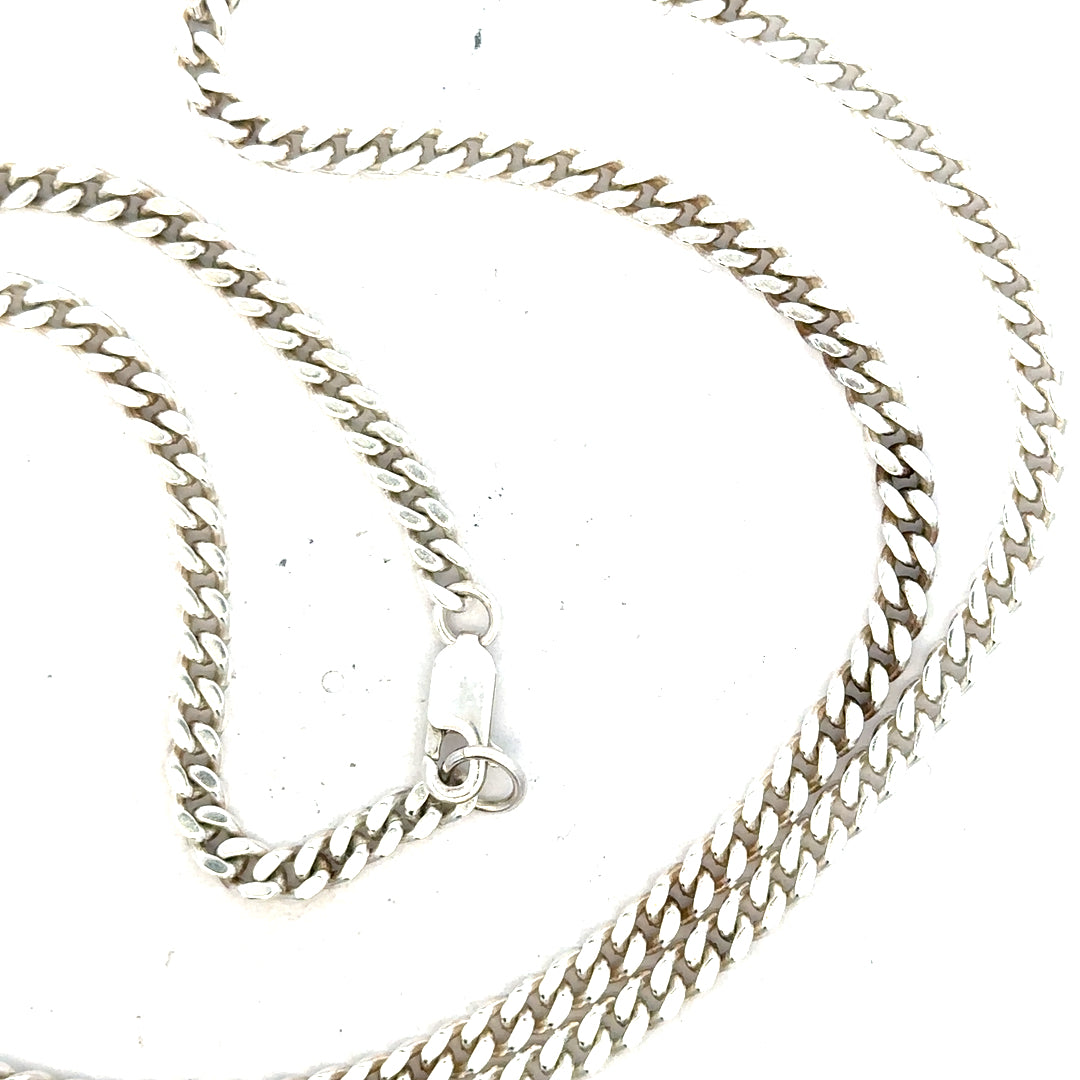 Silver curb chain weighing 24.8g, unbranded jewelry chain with a sleek, classic design.