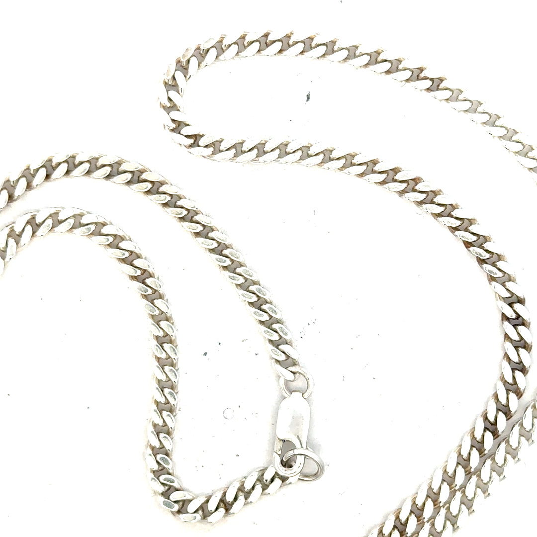 Silver curb chain weighing 24.8g, unbranded jewelry chain with a sleek, interconnected link design.