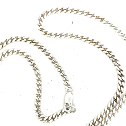Silver curb chain weighing 24.8g, unbranded jewelry chain with a sleek, interconnected link design.
