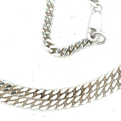 Silver curb chain weighing 24.8g with a classic design, featuring interlinked oval-shaped links, ideal for jewelry or accessories.
