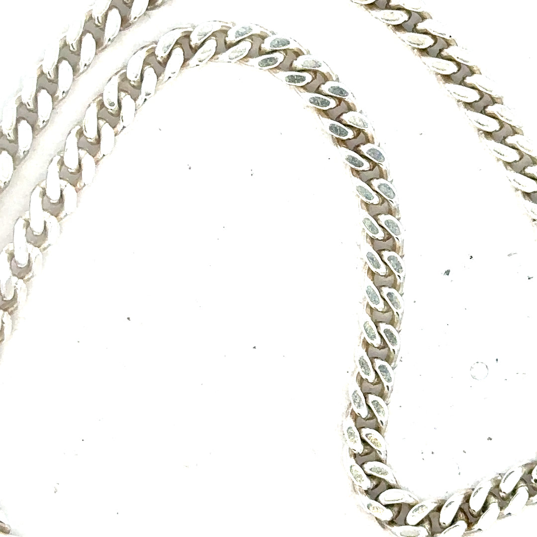 Silver curb chain weighing 24.8g, showcasing a classic unbranded jewelry chain with interlocking links.