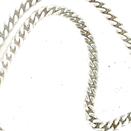 Silver curb chain weighing 24.8g, showcasing a classic unbranded jewelry chain with interlocking links.