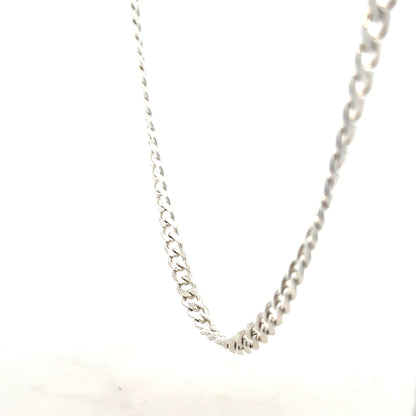 Silver curb chain weighing 27.8g, unbranded jewelry chain with interlocking links, shown in a close-up image.