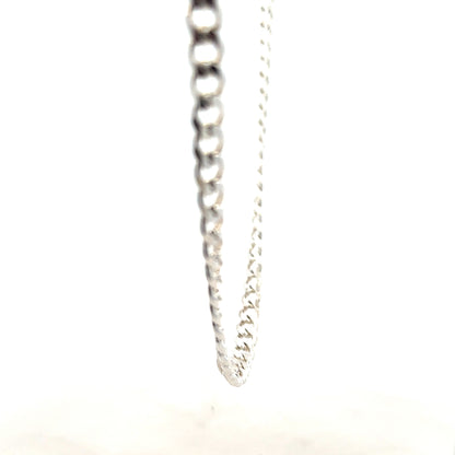 Silver curb chain weighing 27.8g, featuring classic links, ideal for necklaces or jewelry accessories.