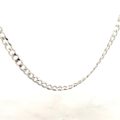 Silver curb chain, 27.8g, showcasing smooth oval links, unbranded jewelry chain for necklaces or accessories.