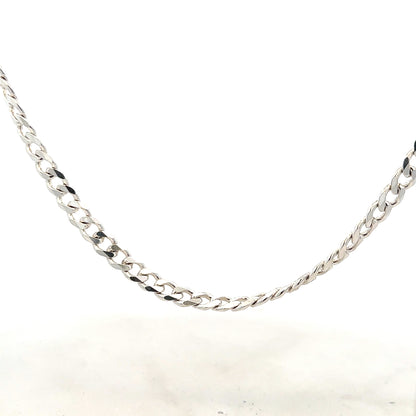 Silver curb chain weighing 27.8g, unbranded jewelry chain with a sleek, interconnected link design.