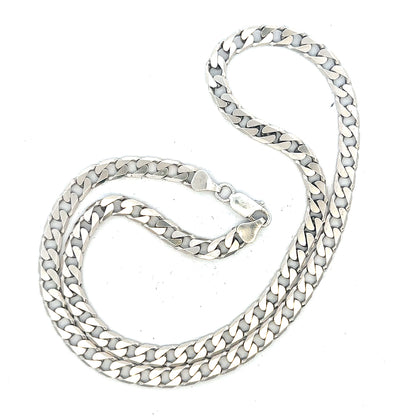 Silver curb chain weighing 31.3g, unbranded jewelry chain with a classic curb link design.